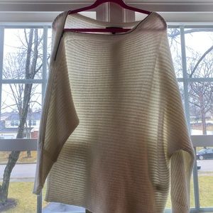 Cream colored of the shoulder sweater with zipper detail
